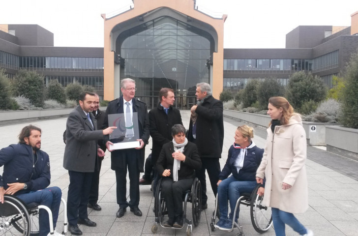 IPC President Andrew Parsons with Paris 2024 team members this morning at the cinema complex that will form the centre of the Athletes' Village at the Games ©ITG