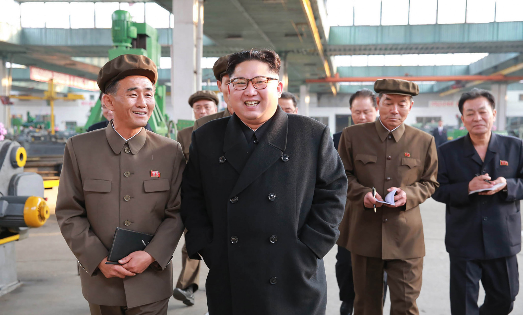 The aggressive noises from North Korean Supreme Leader Kim Jong-un, centre, have caused a great deal of fear and encouraged the demand for an Olympic Truce ©Getty Images