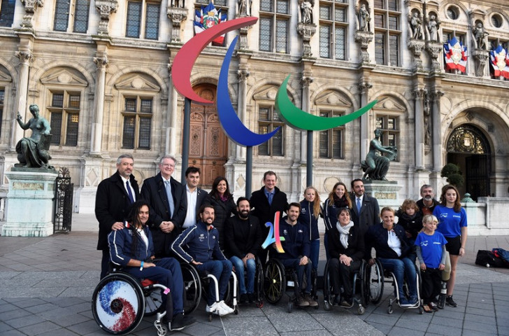 IPC President Andrew Parsons, fifth from left, back row, alongside Anne Hidalgo, Mayor of Paris, outside the Hotel de Ville today ©Getty Images