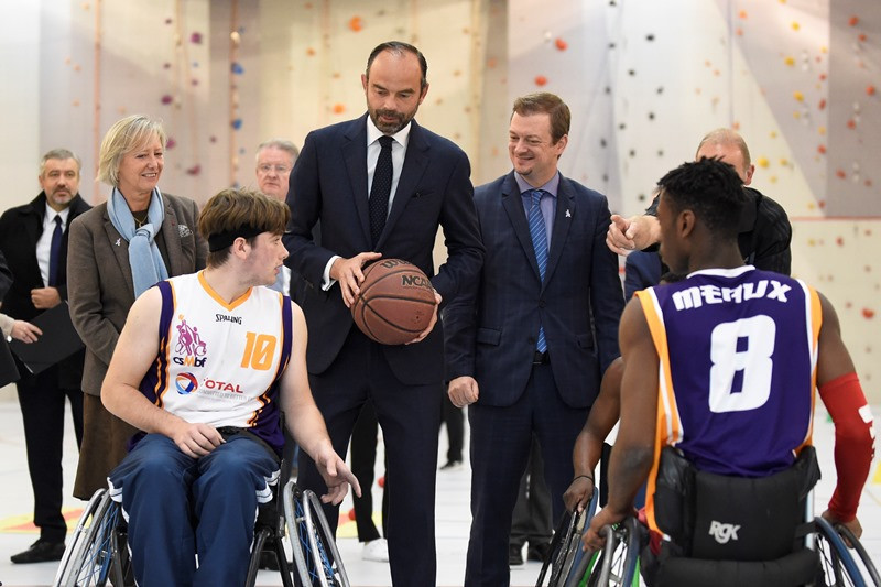IPC President Andrew Parsons watches as French Prime Minister Edouard Philippe prepares to get play underway in the wheelchair basketball display at the College Dora Maar in Saint-Denis ©Getty Images