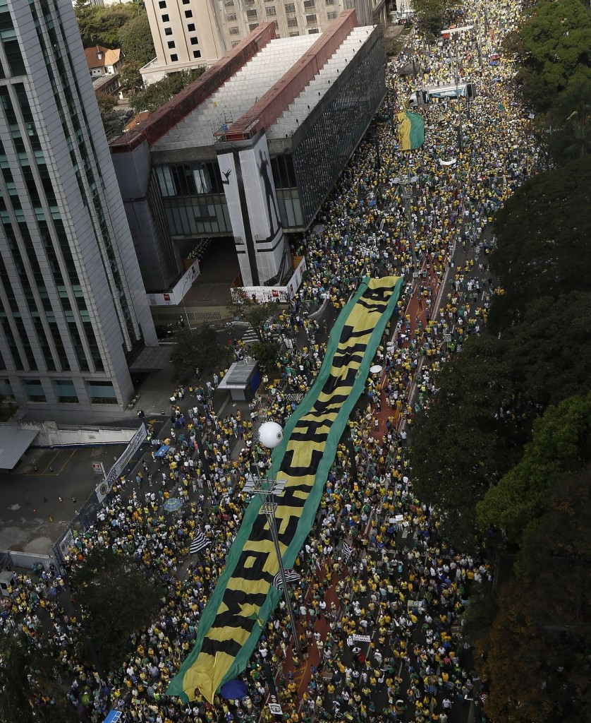 Protesters marching against the Government in Sao Paulo yesterday. Similar eruptions took place in Rio de Janeiro and elsewhere in Brazil ©AFP/Getty Images