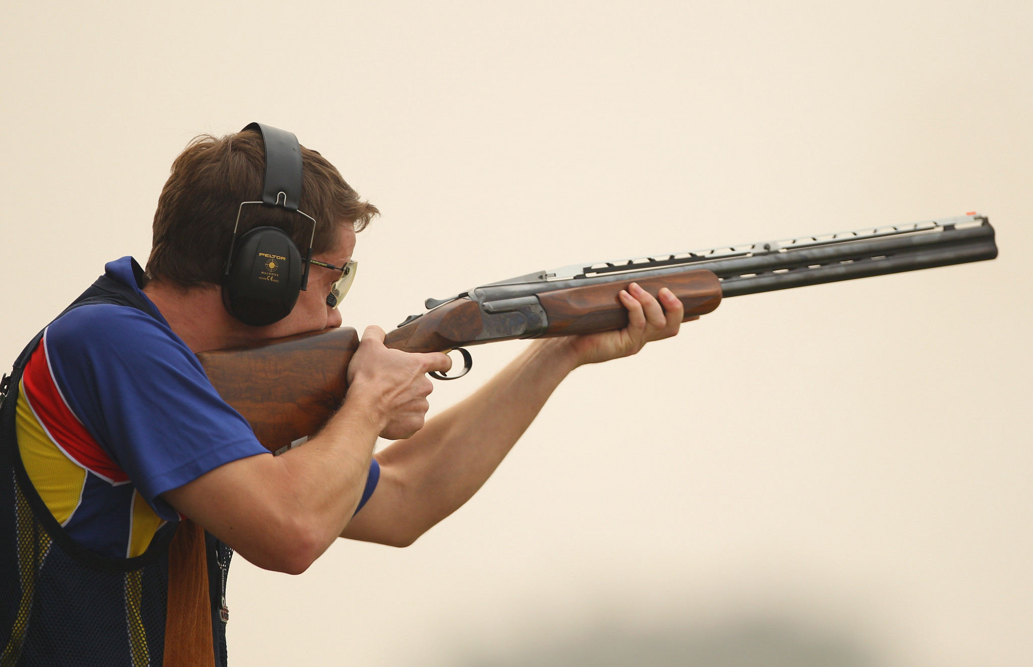 Tim Kneale of the Isle Of Man competes in the men's double trap at the Dr Karni Singh Shooting Range during day four of the Delhi 2010 Commonwealth Games ©Getty Images