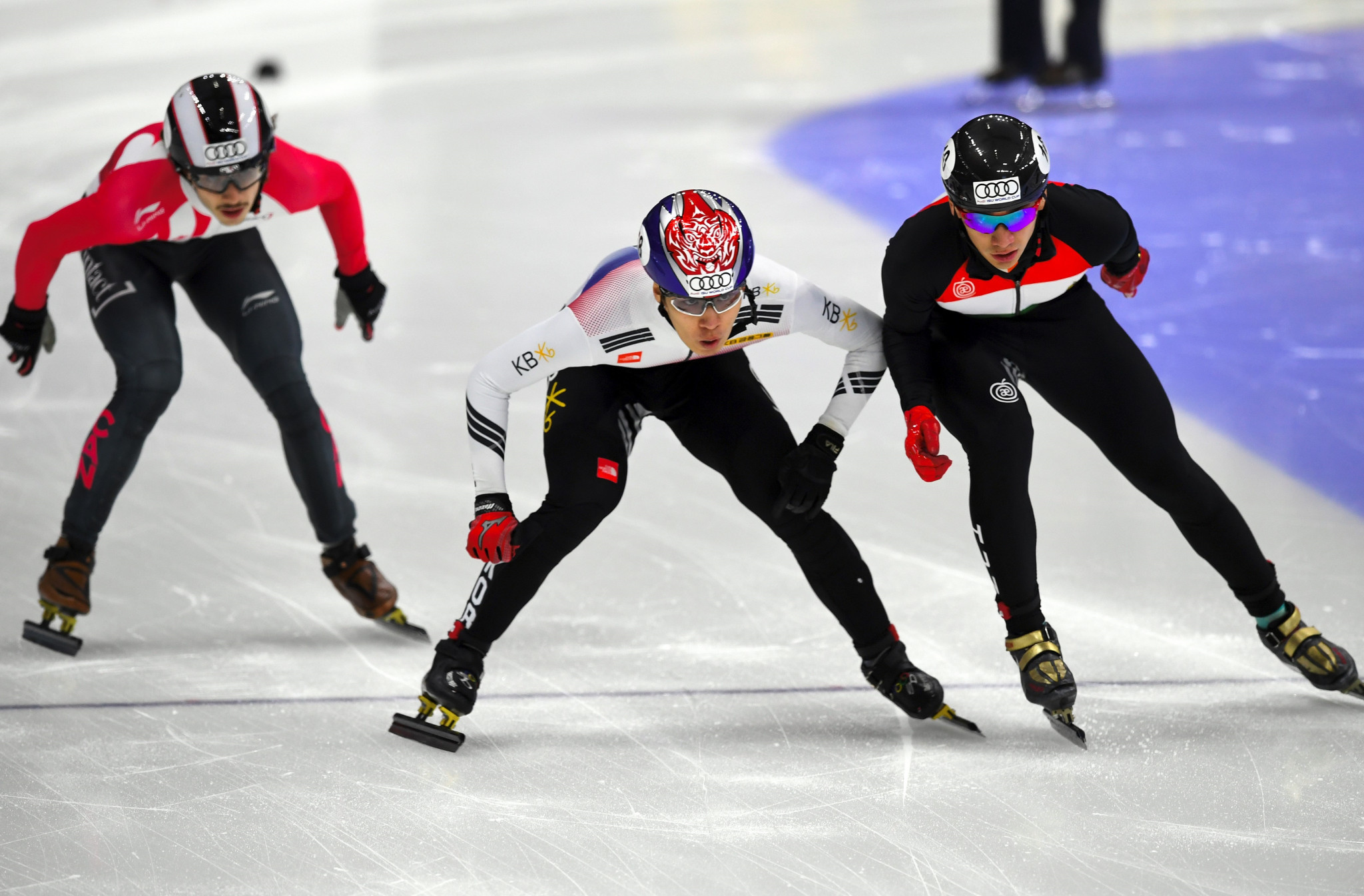 Shaolin Sandor Liu, right, of Hungary and Hwang Dae-Heon, centre, of South Korea compete during the men's 1000 metre final at the ISU World Cup Short Track Speed Skating in Seoul ©Getty Images