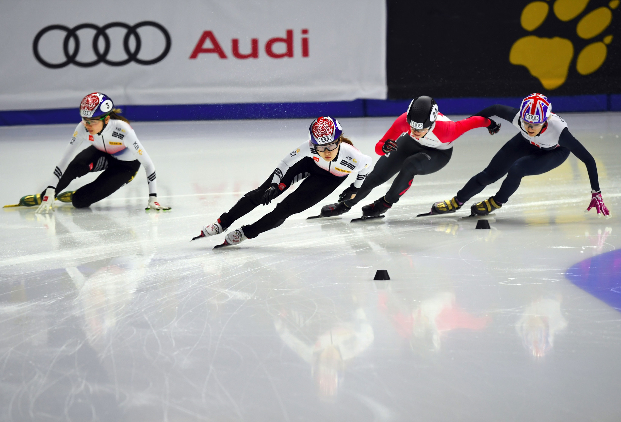 Choi Min-Jeong, second left, of South Korea, Kim Boutin, second right, of Canada and Elise Christie, right, of Great Britain compete as Shim Suk-hee, left, of South Korea falls during the women's 1000 metres at the ISU World Cup Short Track Speed Skating in Seoul ©Getty Images