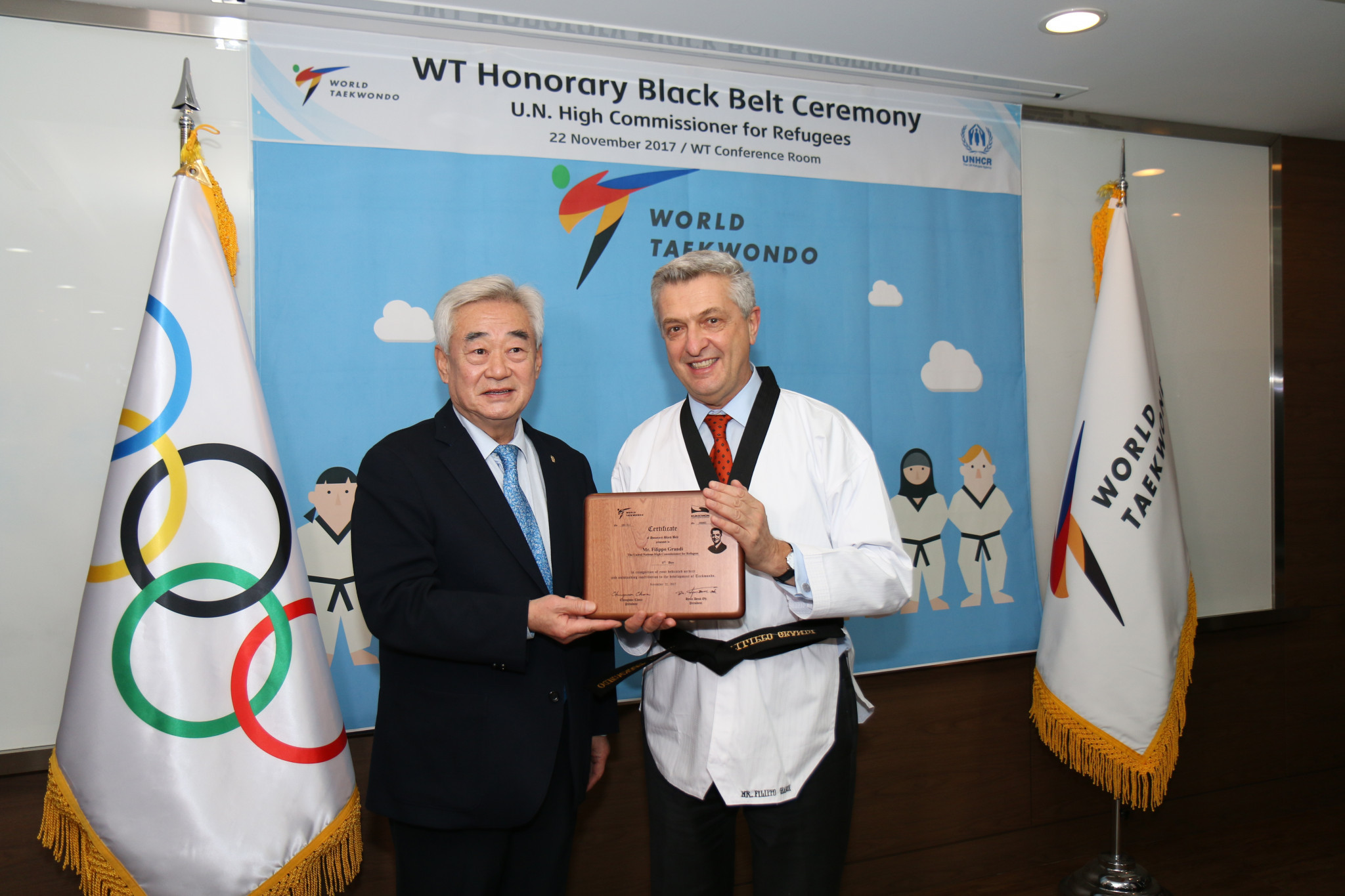 Chungwon Choue awarded a black belt to Filippo Grandi ©World Taekwondo
