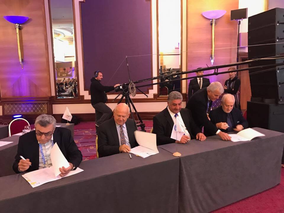 Azad Rahimov, second right, signed the Baku 2019 EYOF contract alongside EOC President  Janez Kocijančič, second left, here today ©ITG