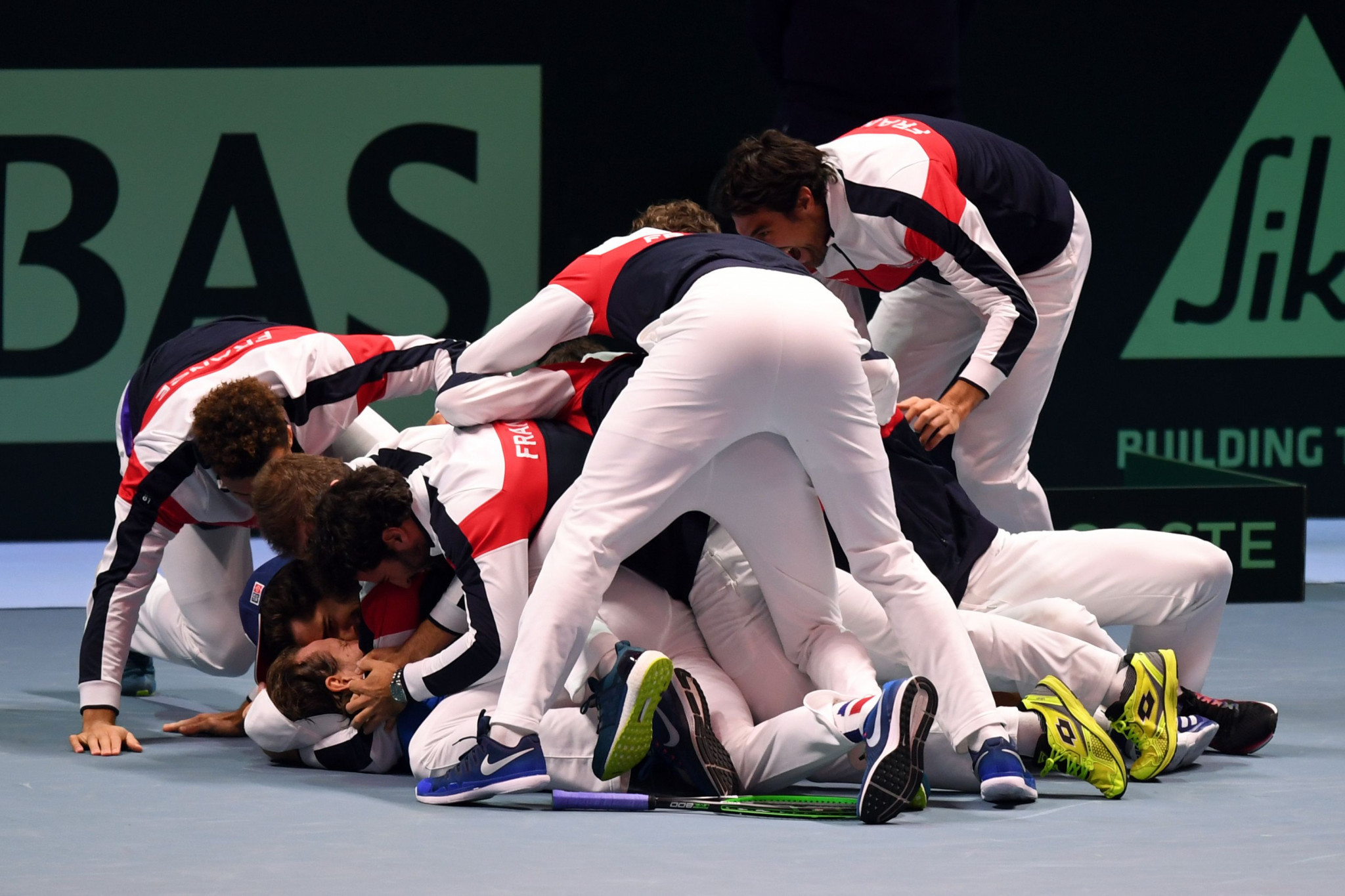 A jubilant France team celebrate their first Davis Cup success in 16 years after a thrilling 3-2 victory over Belgium in Lille ©Getty Images