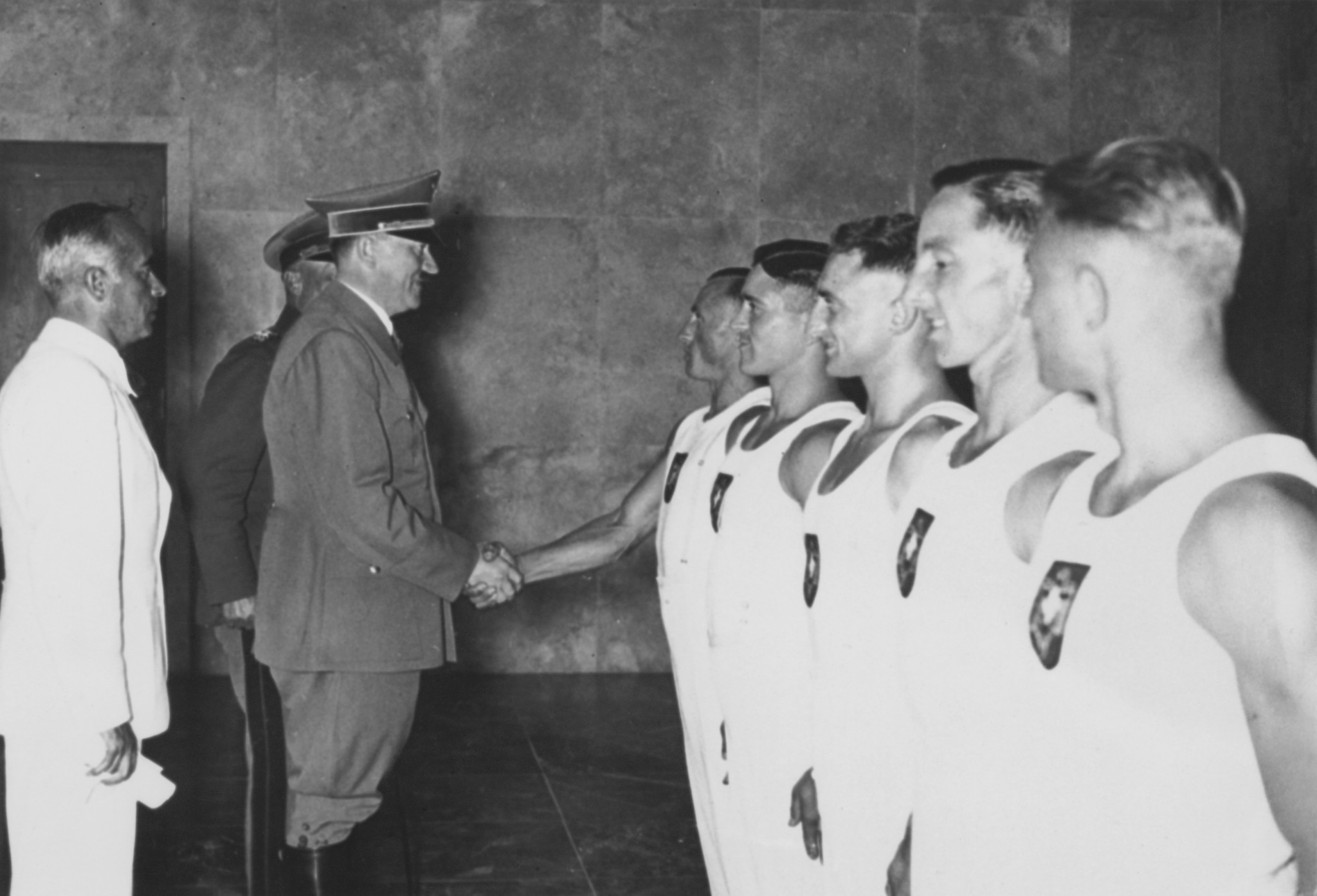 Adolf Hitler shakes hands with British rower Jack Beresford after he and Leslie Frank 