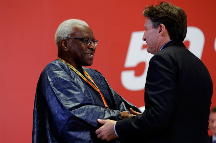 Sebastian Coe accepts the congratulations of the man he will replace as IAAF President, Lamine Diack. The Briton has battles to fight - but he can't do it alone ©Getty Images