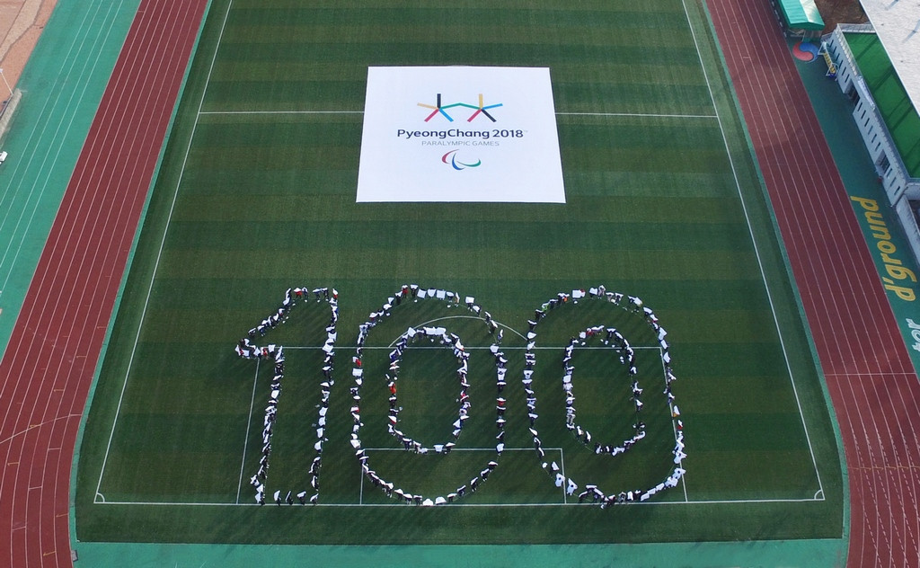 Attendees at the event spelled out 100 to mark the milestone ©Pyeongchang 2018