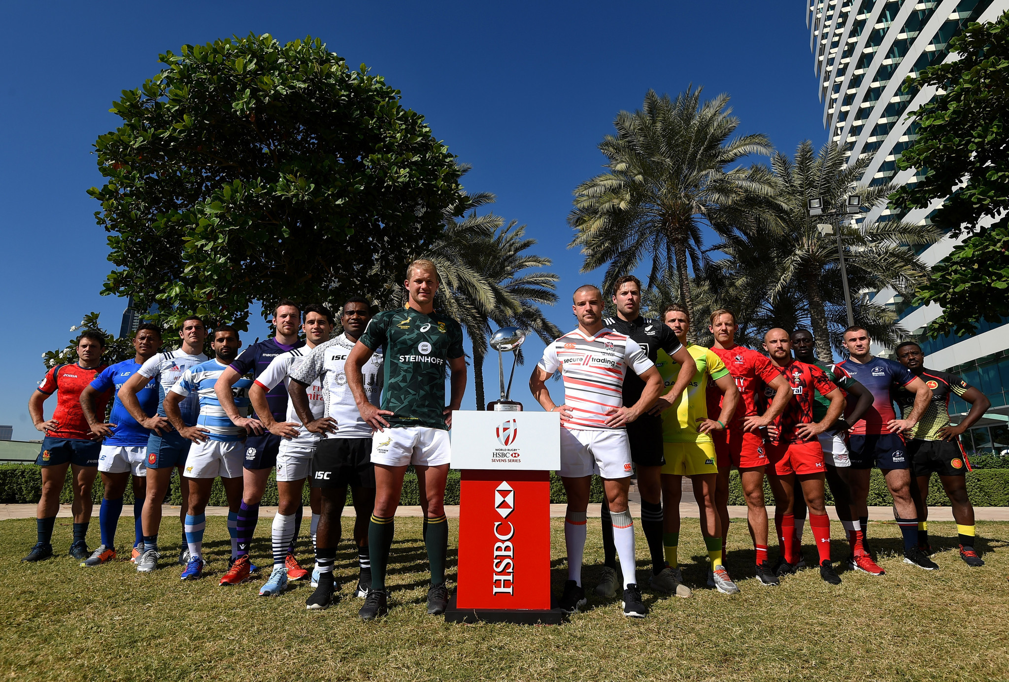 Men's team captains pose for photos with the Dubai Sevens Trophy during the Emirates Dubai Rugby Sevens: HSBC Sevens World Series photocall in Dubai, United Arab Emirates ©Getty Images