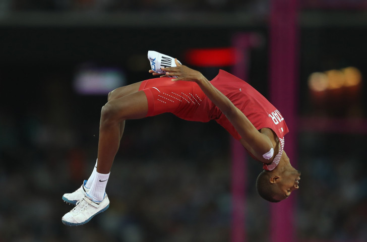 Mutaz Essa Barshim celebrates with a backflip after winning the world high jump title in London this August ©Getty Images
