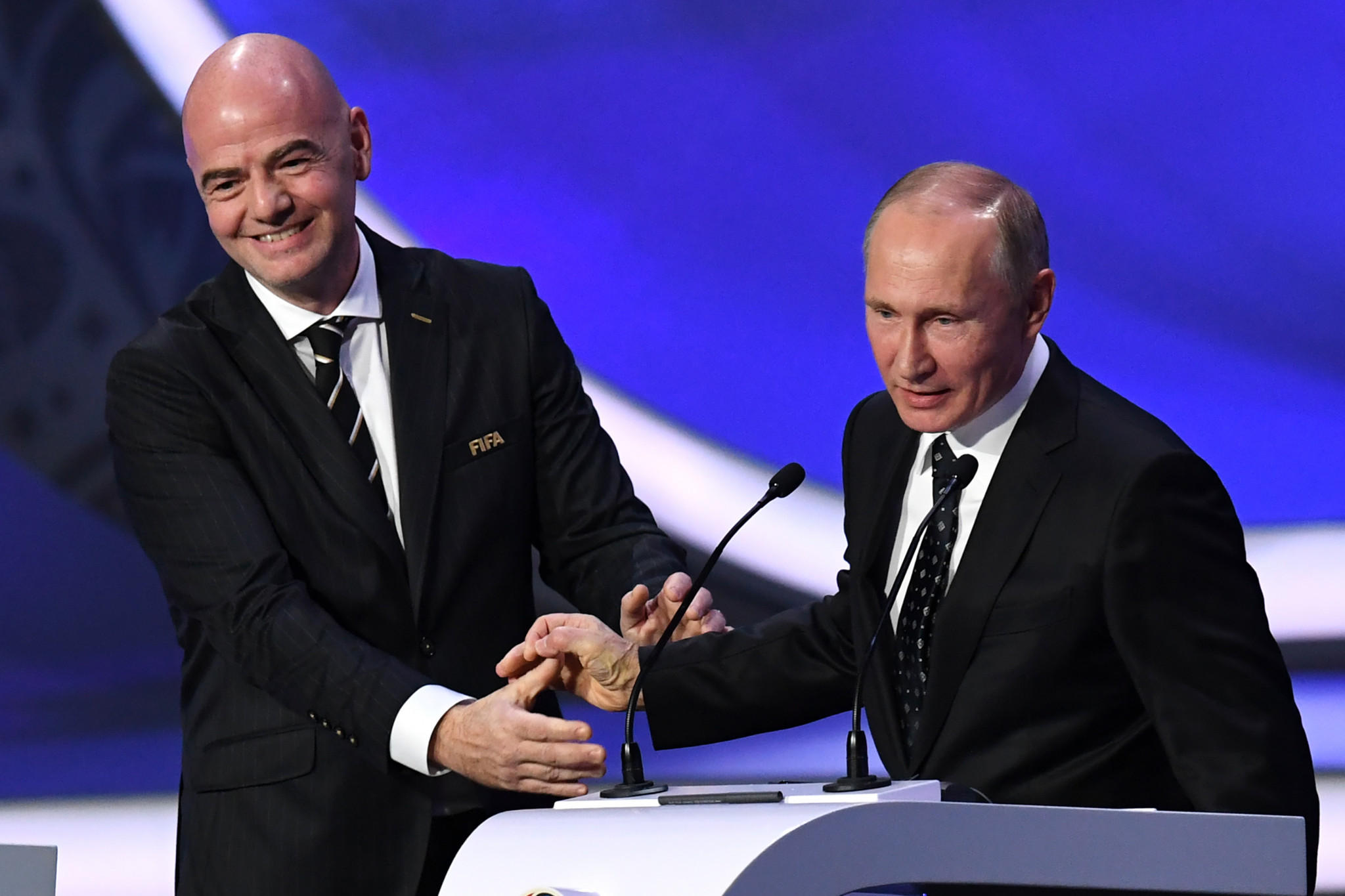 FIFA President Gianni Infantino enthusiastically greets Vladimir Putin at the World Cup draw in Moscow but he was probably less impressed with the performance earlier of Deputy Prime Minister Vitaly Mutko ©Getty Images