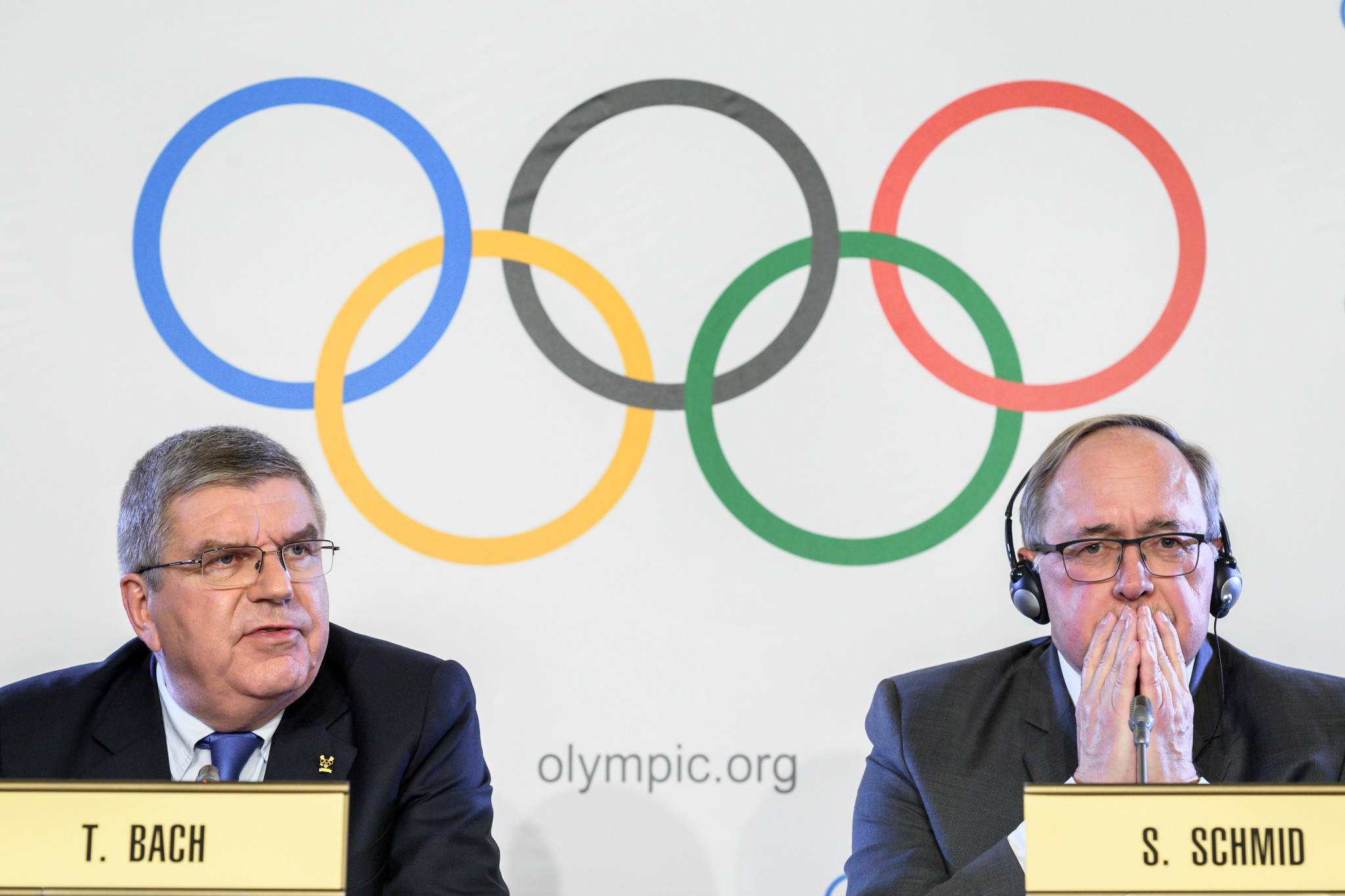 IOC President Thomas Bach, left, alongside Samuel Schmid during the announcement today ©Getty Images