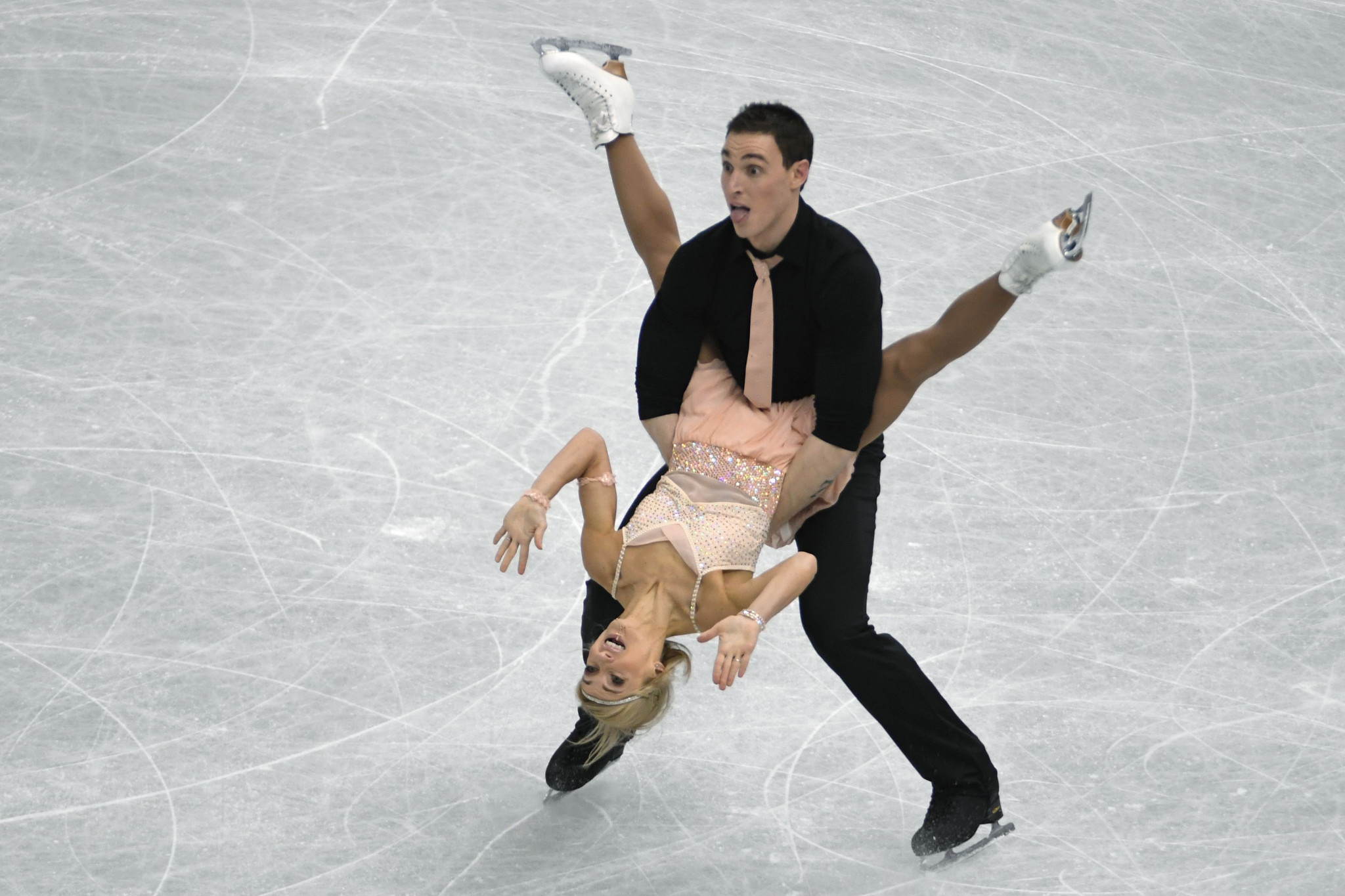 Aljona Savchenko and Bruno Massot battled wardrobe problems before topping the pairs standings ©Getty Images