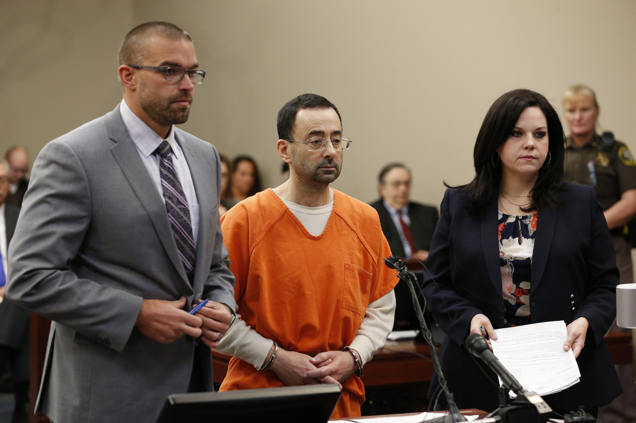 Larry Nassar, centre, has been sentenced to 60 years in jail ©Getty Images