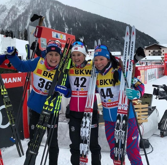 Ingvild Flugstad Østberg, centre, took another title in Davos in the FIS Cross-Country Ski World Cup ©FIS