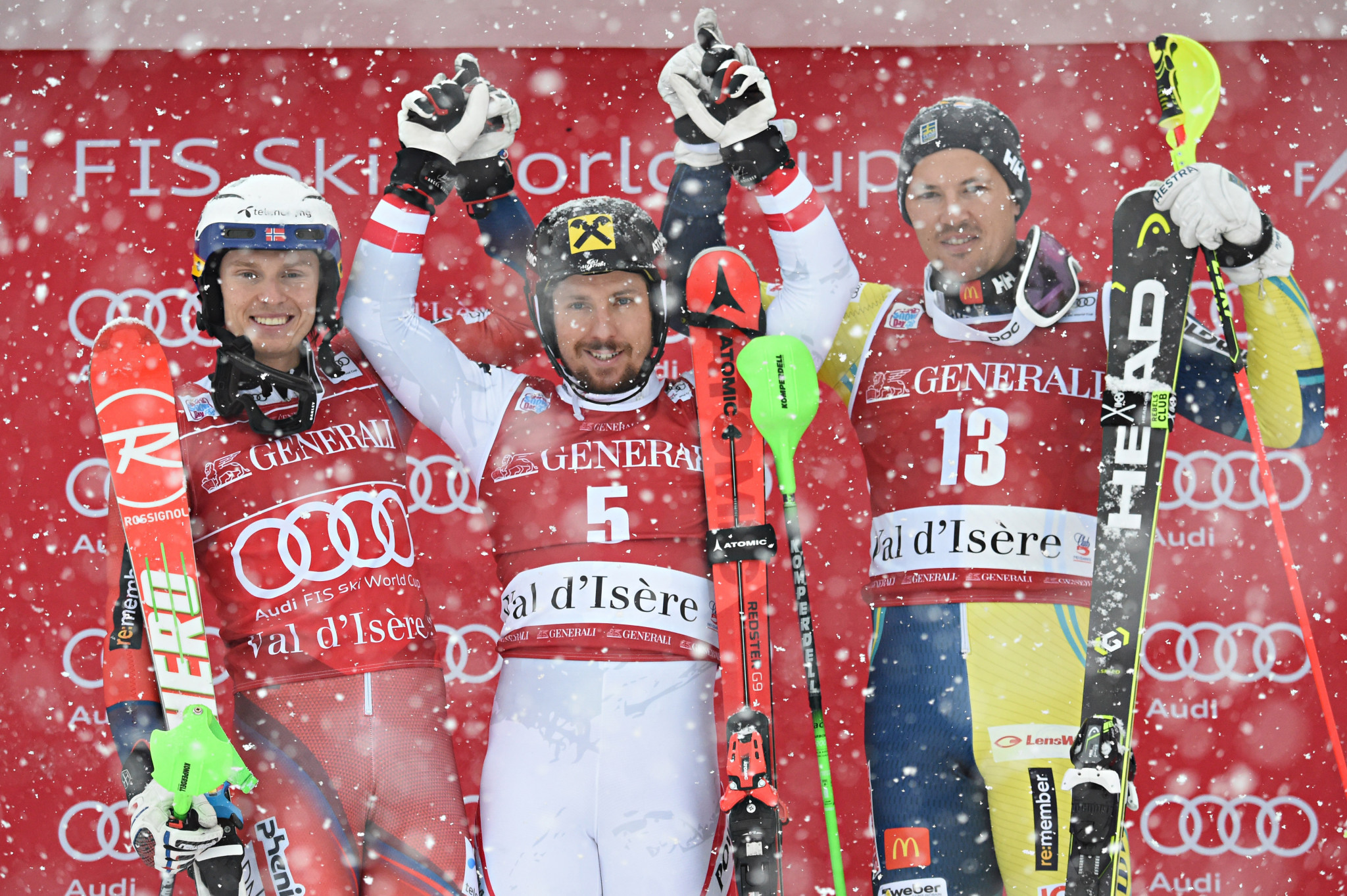 Henrik Kristoffersen, of Norway, takes second place, Marcel Hirscher, of Austria, first place and Andre Myhrer, of Sweden, third place during the FIS Alpine Ski World Cup men's slalom in Val-d'Isere ©Getty Images
