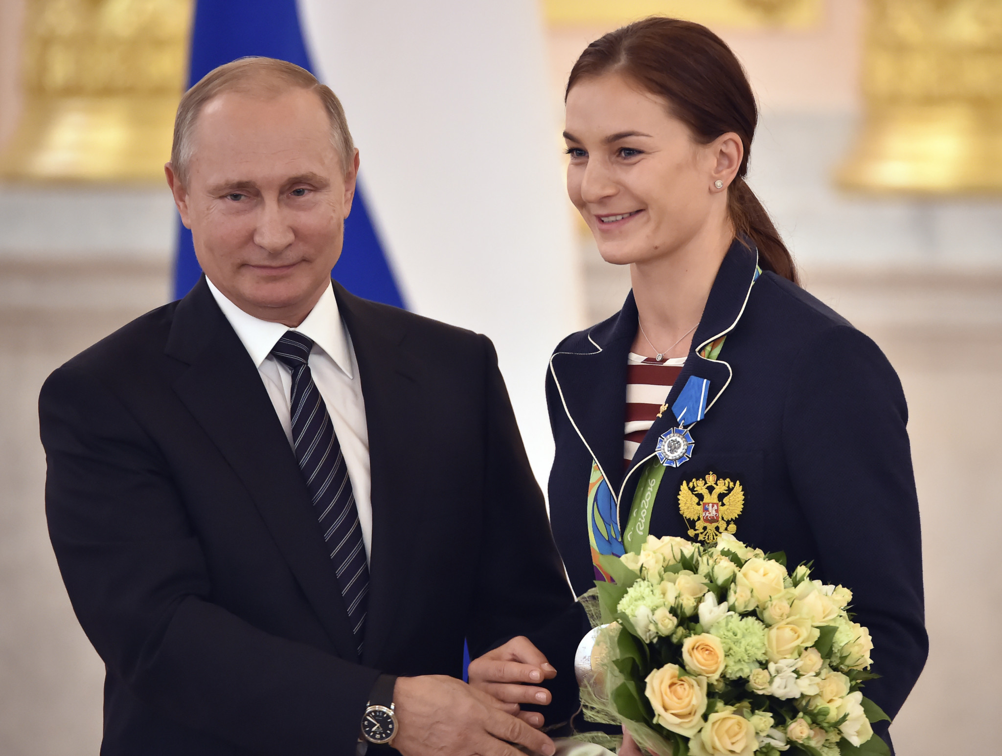 Sofya Velikaya, seen here with Vladimir Putin, says that all Russian athletes have announced plans to complete as neutral athletes under the Olympic flag at next year’s Winter Olympic’s in Pyeongchang ©Getty Images