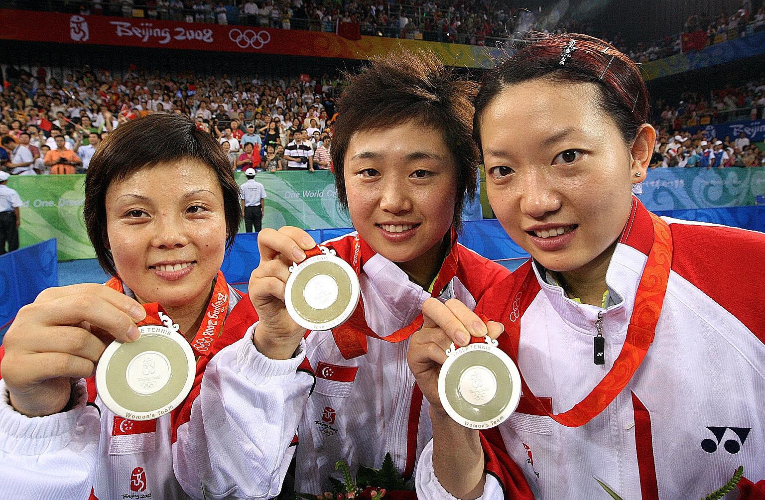 Singapore's women's table tennis team celebrate their Olympic silver at Beijing 2008 - the country's first medal for 48 years and the result of Project 0812, a success celebrated in a newly-released book ©Getty Images