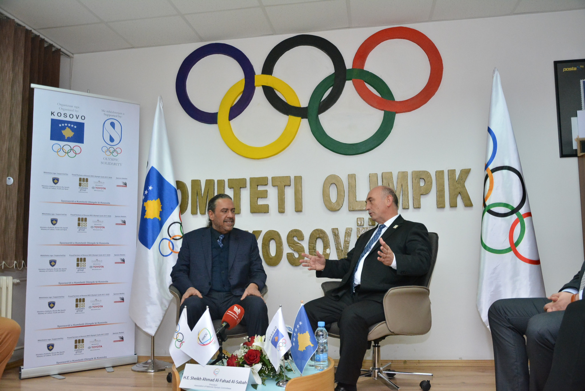 Sheikh Ahmad Al-Fahad Al-Sabah, left, alongside Besim Hasani at the Kosovo Olympic Committee headquarters ©KOC