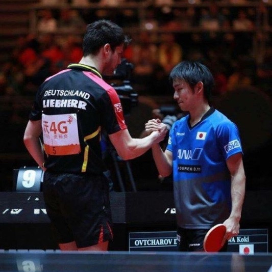 Germany's Dimitrij Ovtcharov, left, beat Koki Niwa, right, of Japan to claim the world number one spot ©ITTF 
