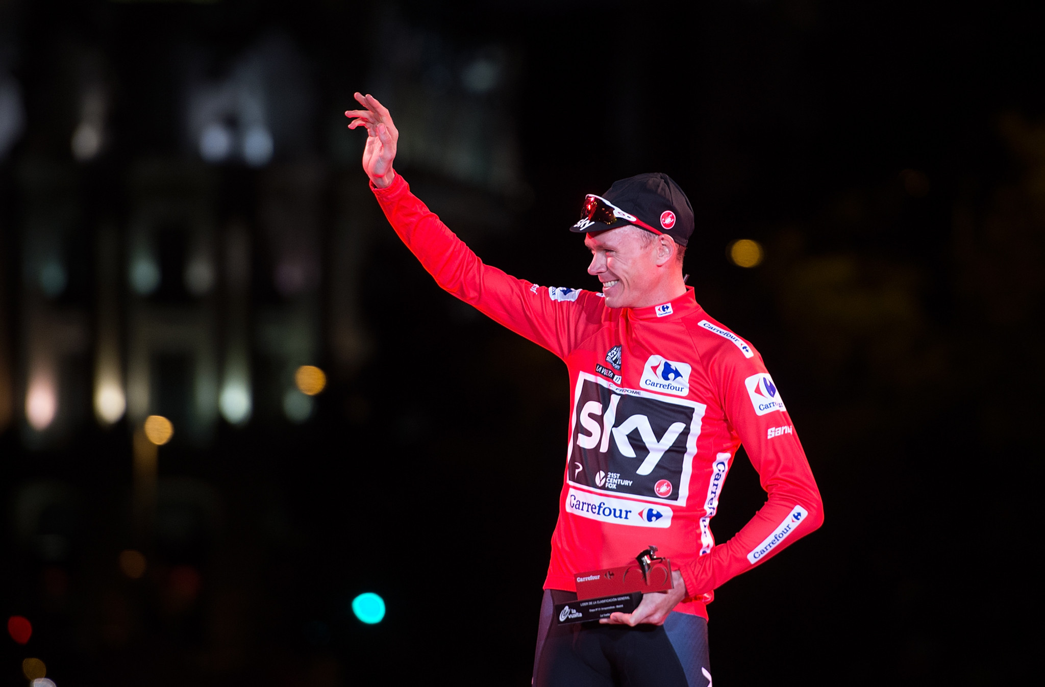 Chris Froome, wearing the Vuelta leader's red jersey, has denied all wrongdoing and has pledged to clear his name ©Getty Images