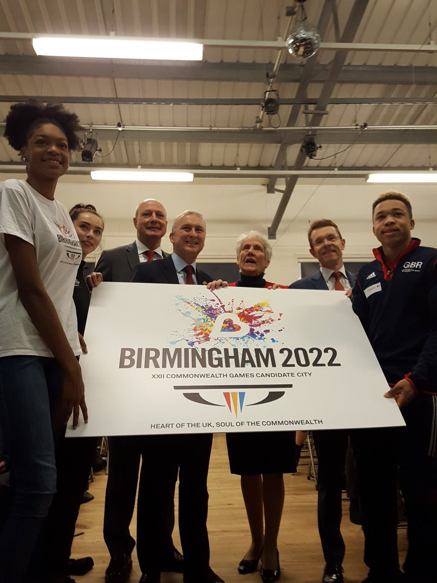 Birmingham City Council leader Ian Ward, fourth left, and CGF President Louise Martin, third right, celebrate after Birmingham was officially awarded the 2022 Commonwealth Games ©Twitter