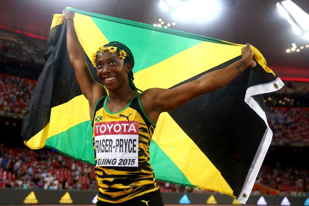 Shelly-Ann Fraser-Pryce of Jamaica celebrates after winning gold in the Women's 100 metres final during day three of the 15th IAAF World Athletics Championships  ©Getty Images