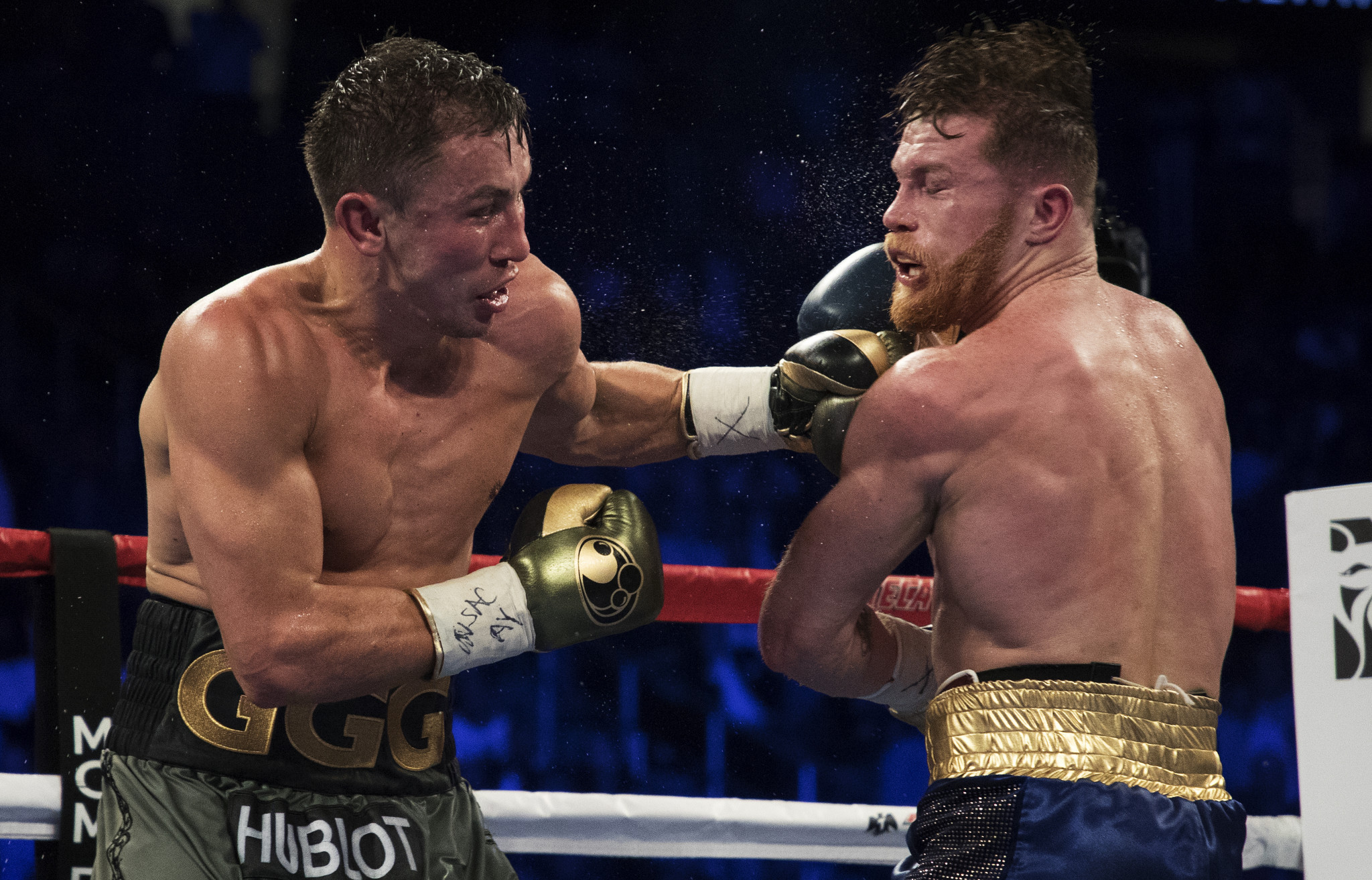 Gennady Golovkin punches Canelo Alvarez during their WBC, WBA and IBF middleweight championship bout at T-Mobile Arena in September in Las Vegas ©Getty Images