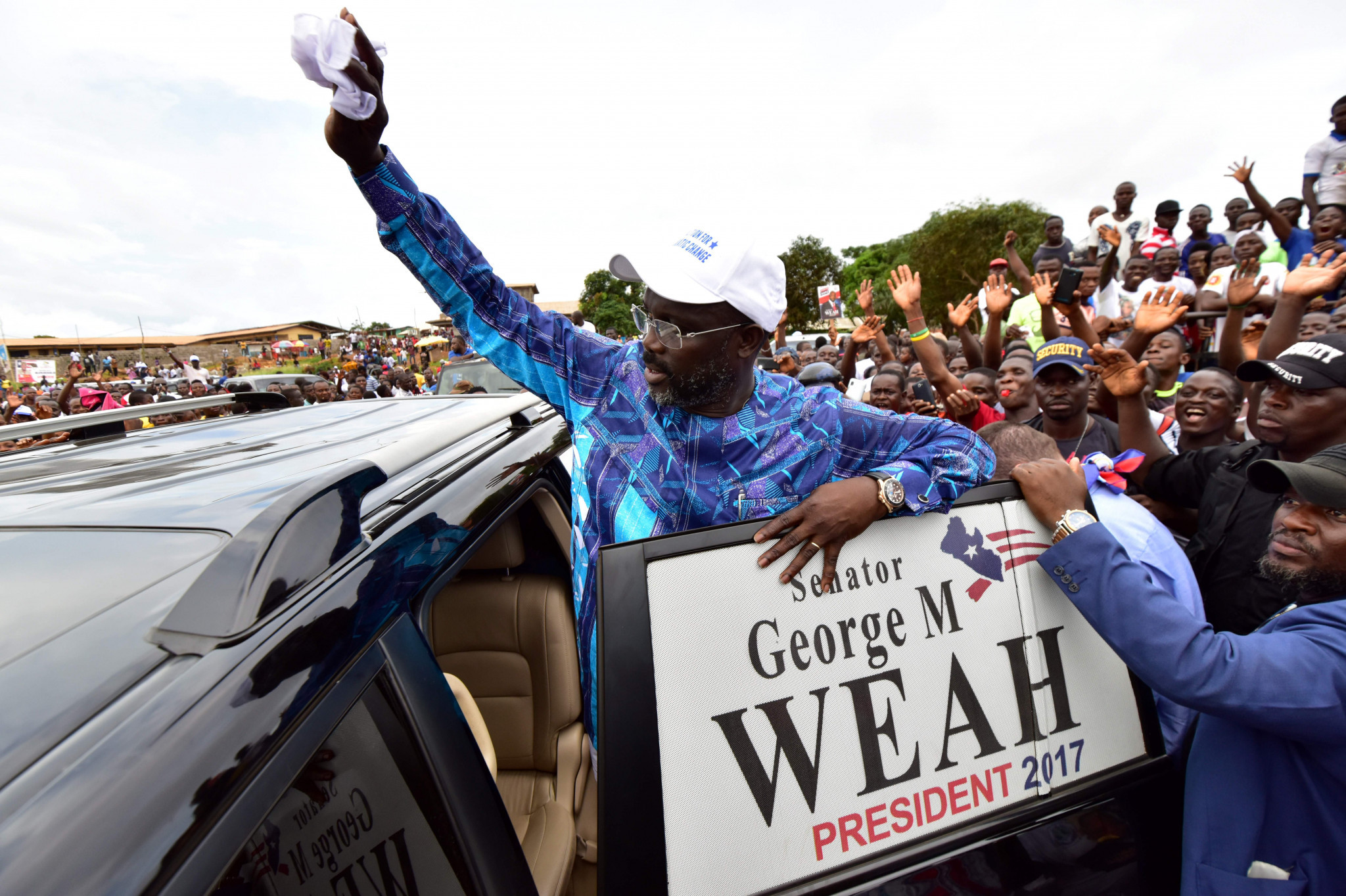 George Weah, seen here greeting his massed ranks of supporters during a campaign rally in Monrovia, has vowed to change the face of politics in war-torn Liberia ©Getty Images