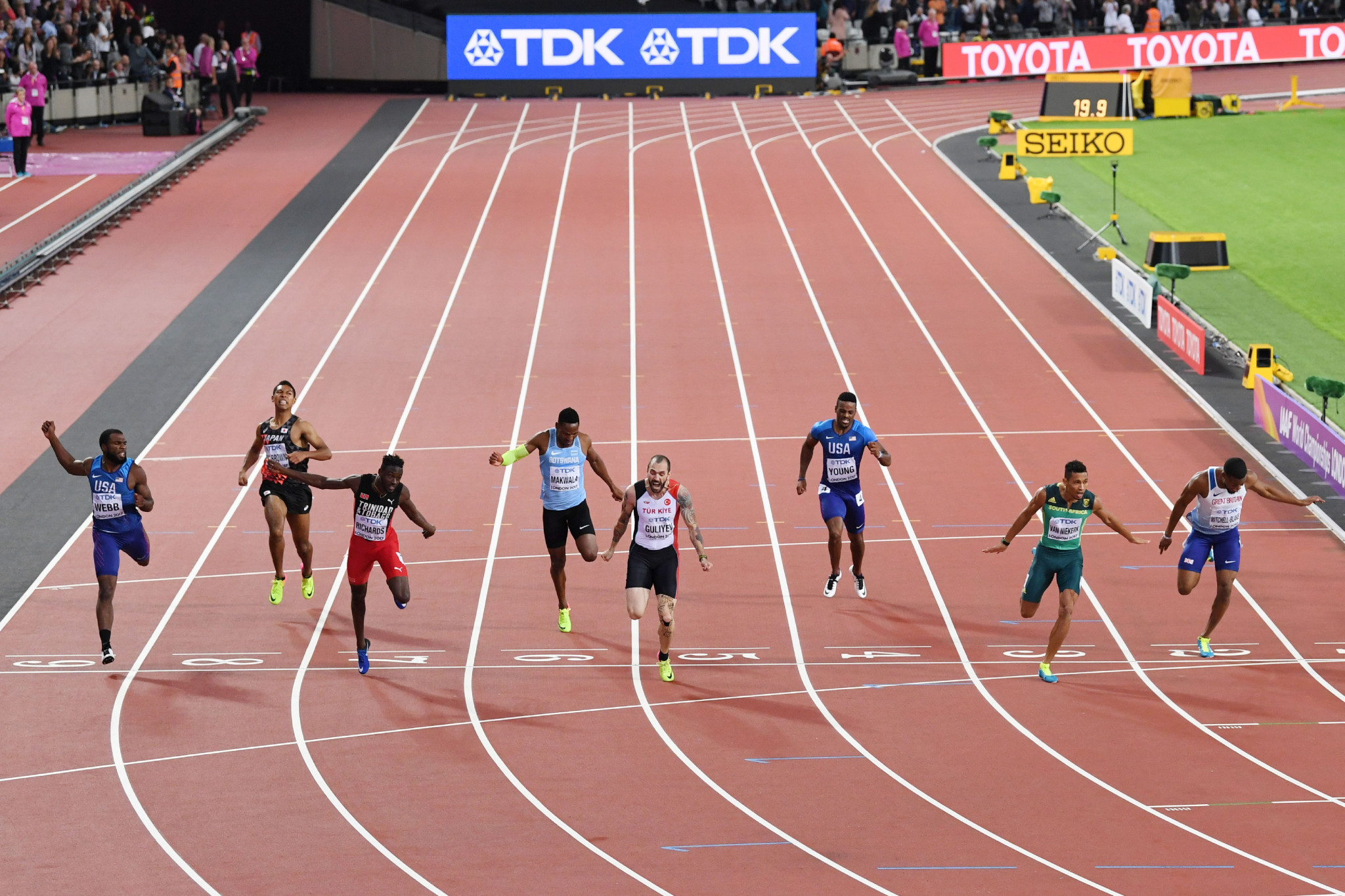 Wayde Van Niekerk, second right, fails in his attempt to win the 400/200m double at this year's IAAF World Championships as he is beaten to the line by Ramil Guliyev of Turkey ©Getty Images