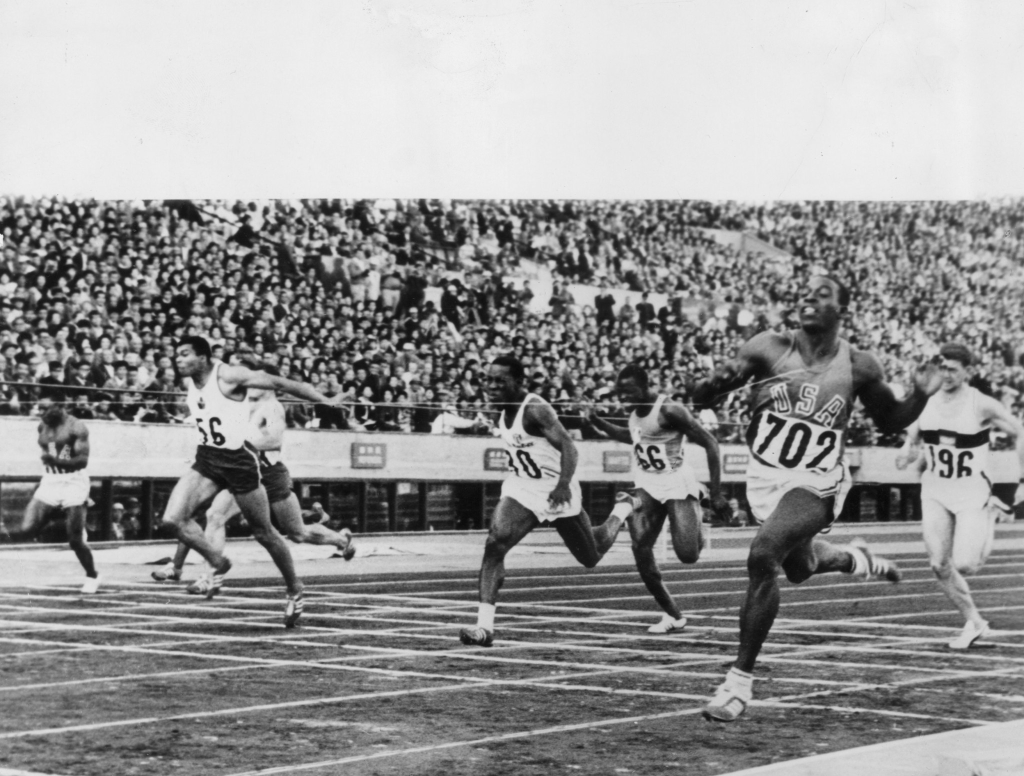 The Baton passed a statue in honour of Canadian sprinter Harry Jerome, seen here at the Tokyo Olympics, numbered 56, finishing third behind Robert Hayes, of the USA, and Enrique Figuerola Camue, of Cuba ©Getty Images