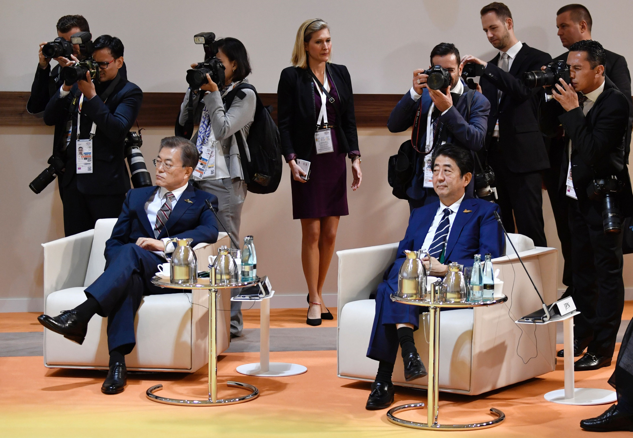 The administration of South Korea President Moon Jae-in, left, invited Shinzō Abe, right, to attend the Pyeongchang 2018 Opening Ceremony ©Getty Images