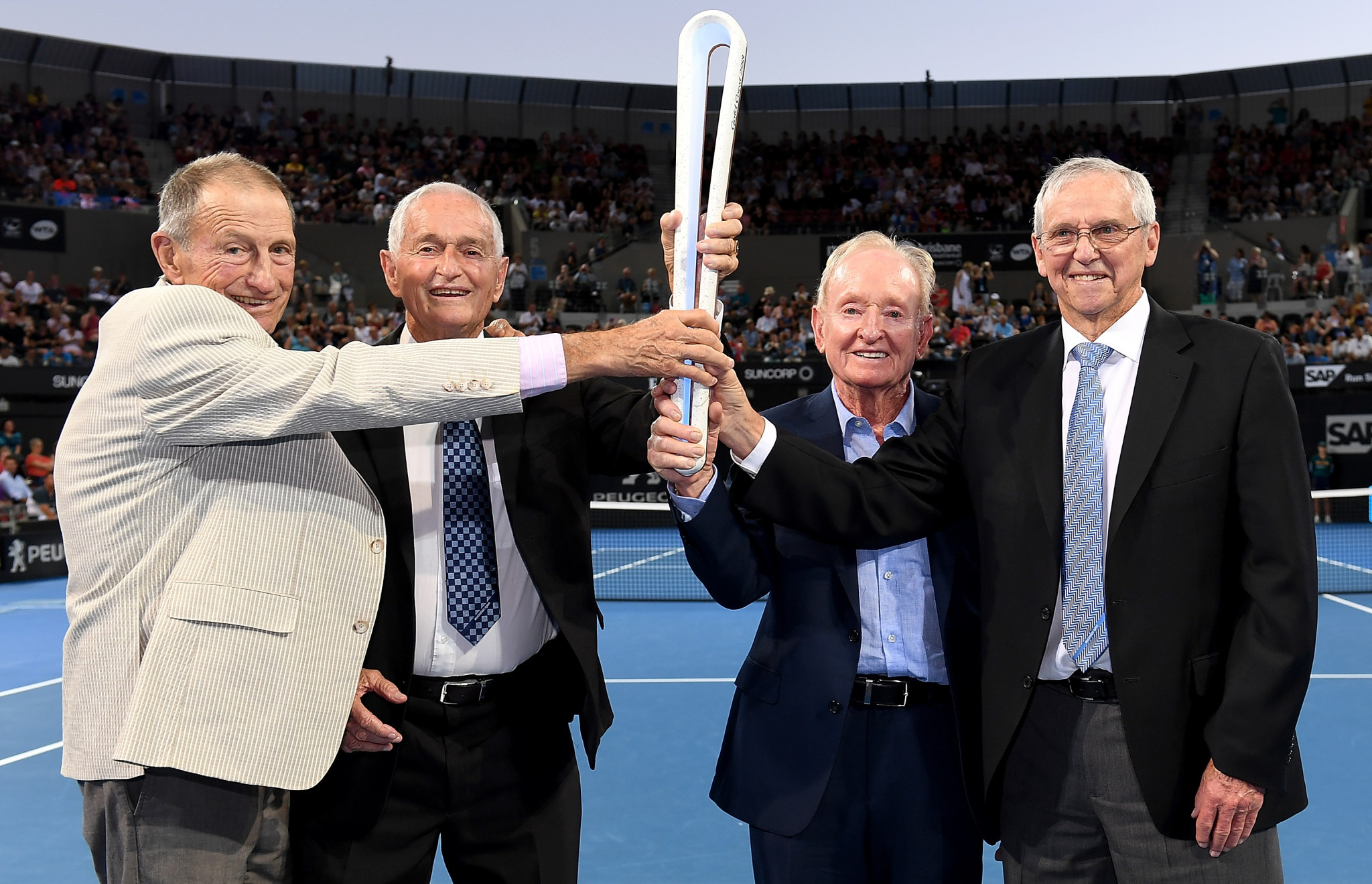 Ashley Cooper, Mal Anderson, Rod Laver and Roy Emerson posed with the Baton ©Getty Images