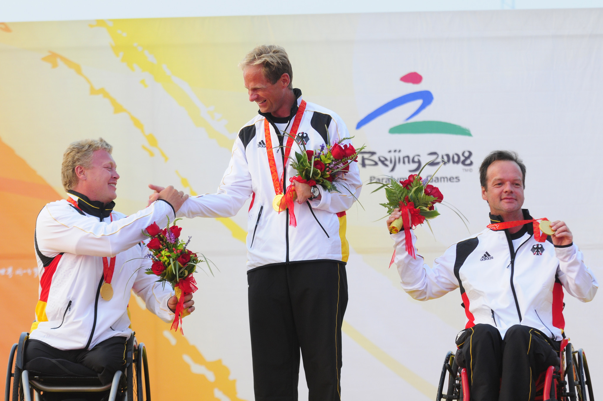 Jens Kroker, centre, won three Paralympic medals including gold in Beijing ©Getty Images