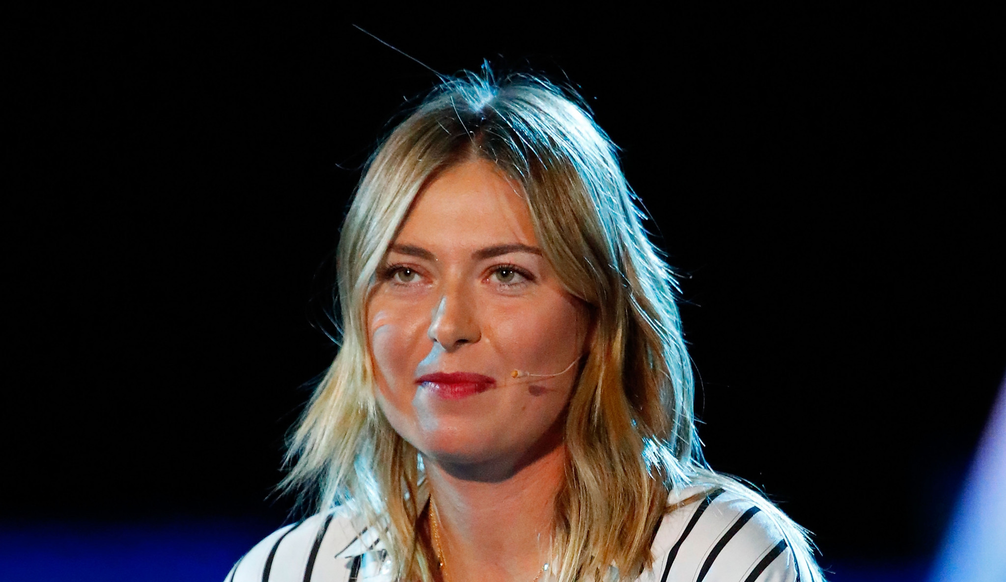 The Australian Open said Maria Sharapova was the only former champion available to carry the trophy ©Getty Images