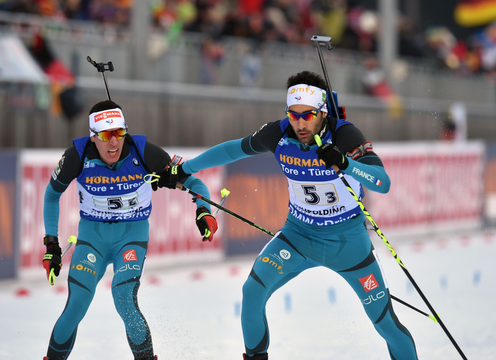 Martin Fourcade, right, switched from the fourth leg to the third but could not guide France to victory ©Getty Images