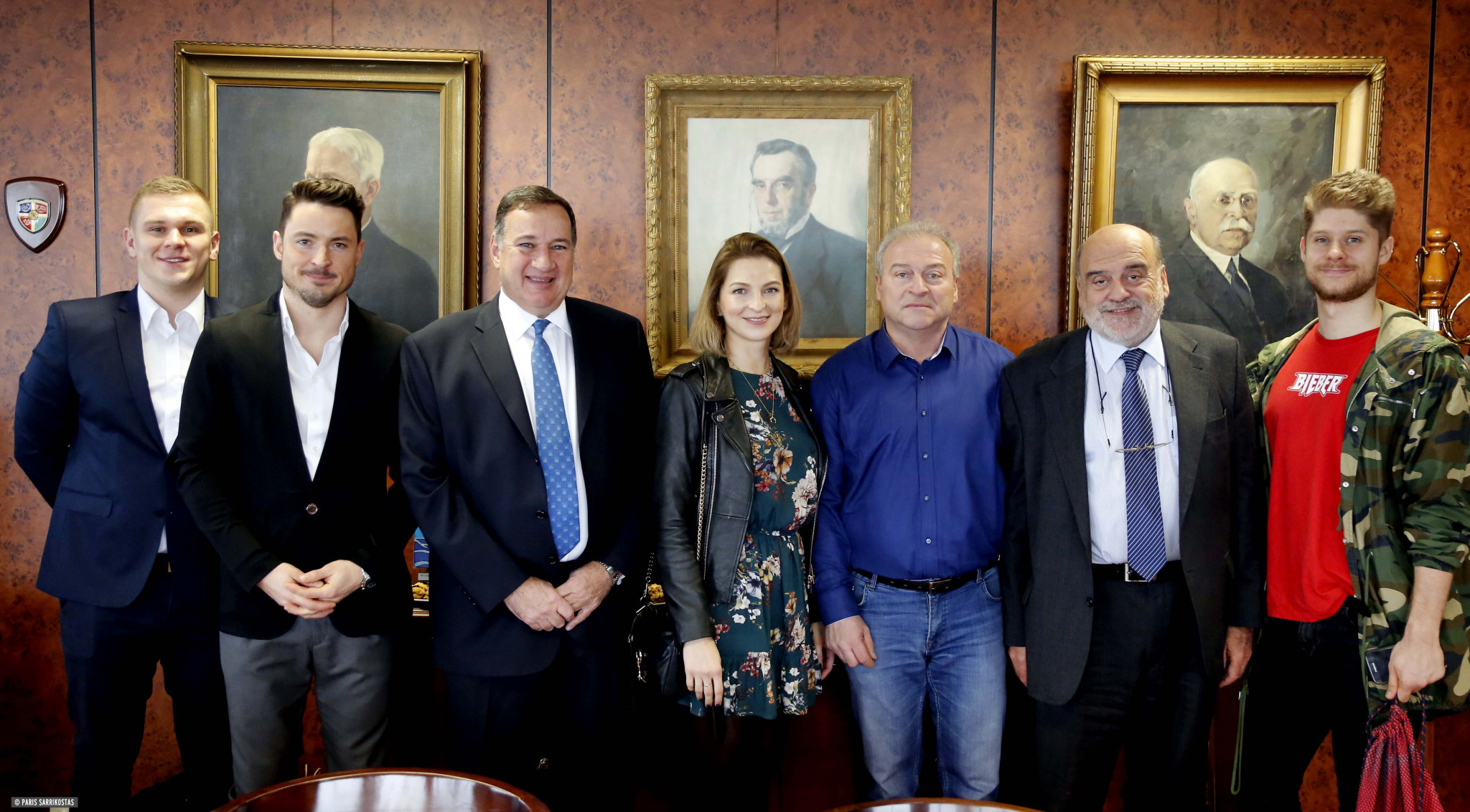 Hellenic Olympic Committee officials posing with figures from Polish sports clothing company 4F ©HOC/Facebook