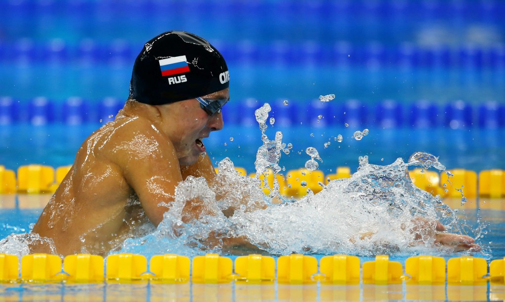 Russia's Anton Chupkov narrowly missed out on another world junior record as he won gold in the men's 100m breaststroke