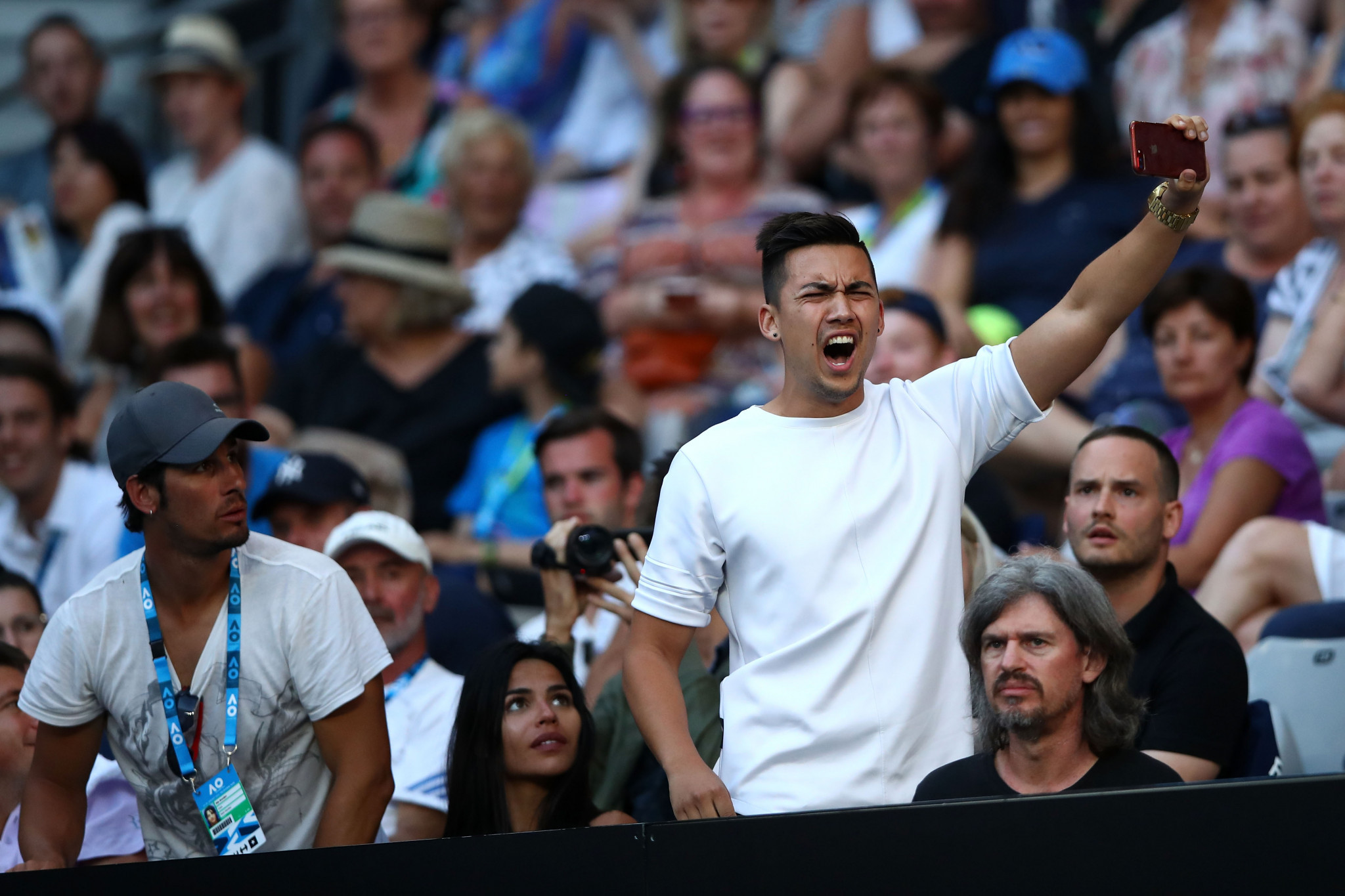 A spectator interrupts the second round match between Nick Kyrgios of Australia and Viktor Troicki of Serbia ©Getty Images