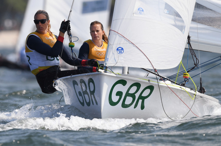 Britain's Hannah Mills, pictured right winning Rio 2016 470 gold with Saskia Clark, will compete with new partner Eilidh McIntyre at the first 2018 World Cup race in Miami ©Getty Images