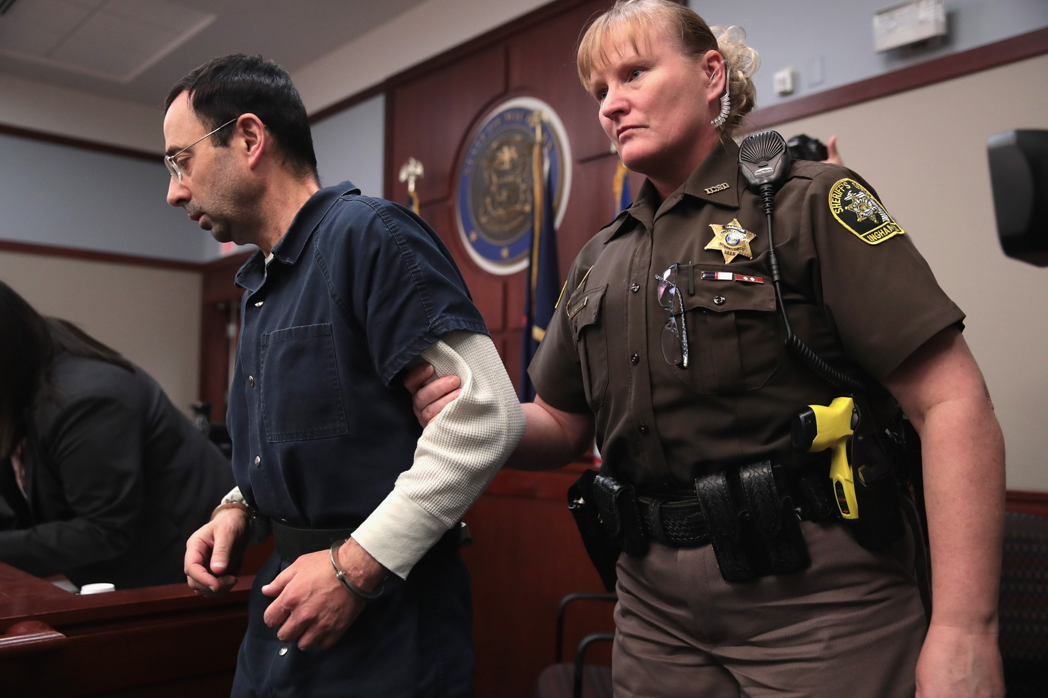 Larry Nassar, left, faces a minimum sentence of 25 to 40 years in prison ©Getty Images