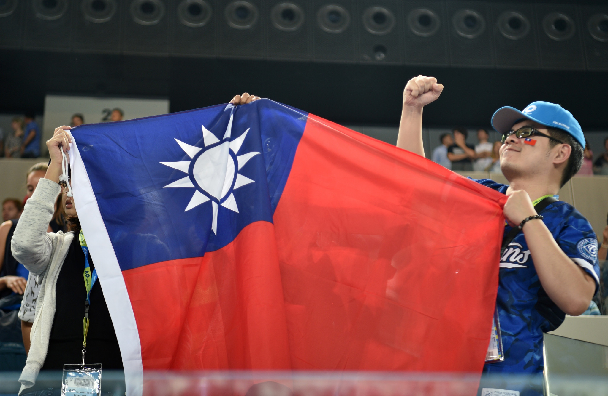Fans of Hsieh Su-Wei hold the Taiwan flag after her victory today ©Getty Images