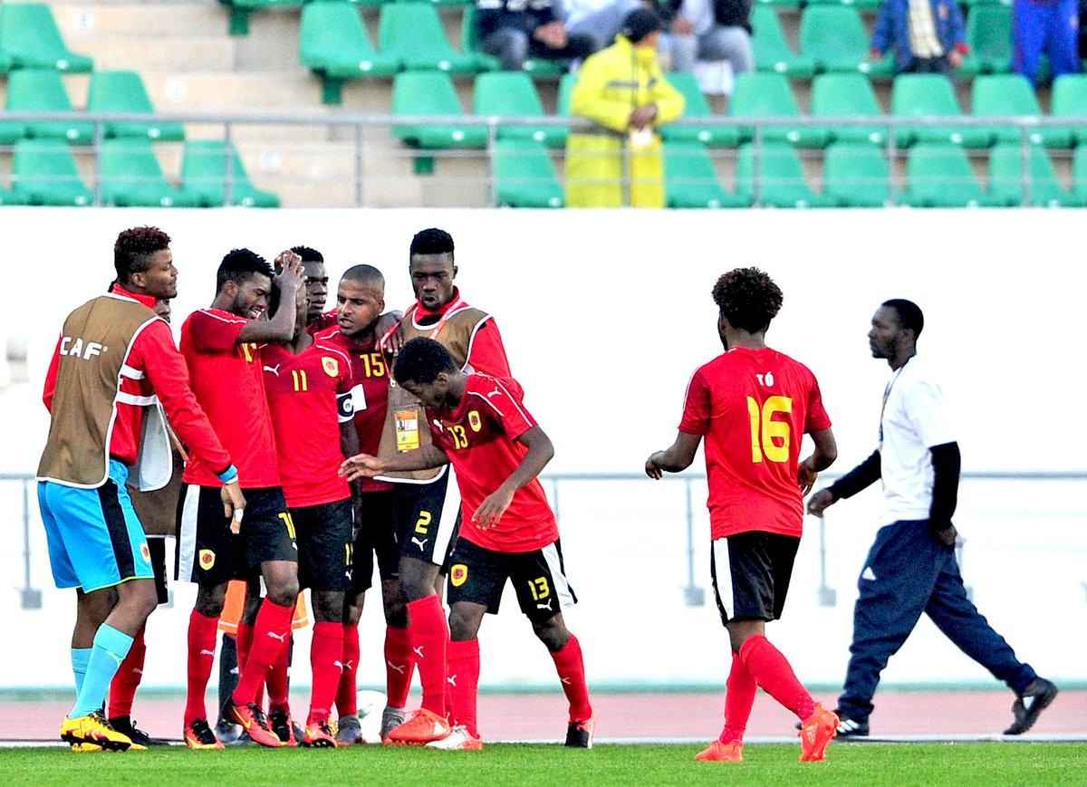 Angola celebrate Ricardo Job Estévão's successful penalty against Cameroon which ensured they reached the next round of the African Nations Championship ©Twitter