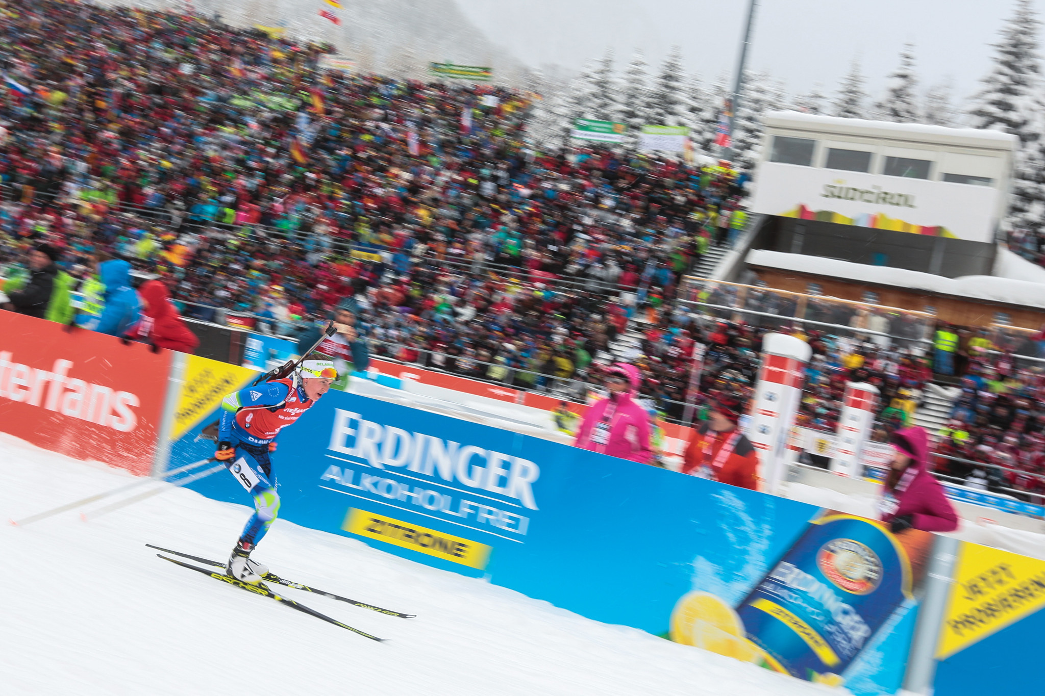 Domracheva and Fourcade clinch mass start titles at IBU World Cup in Antholz