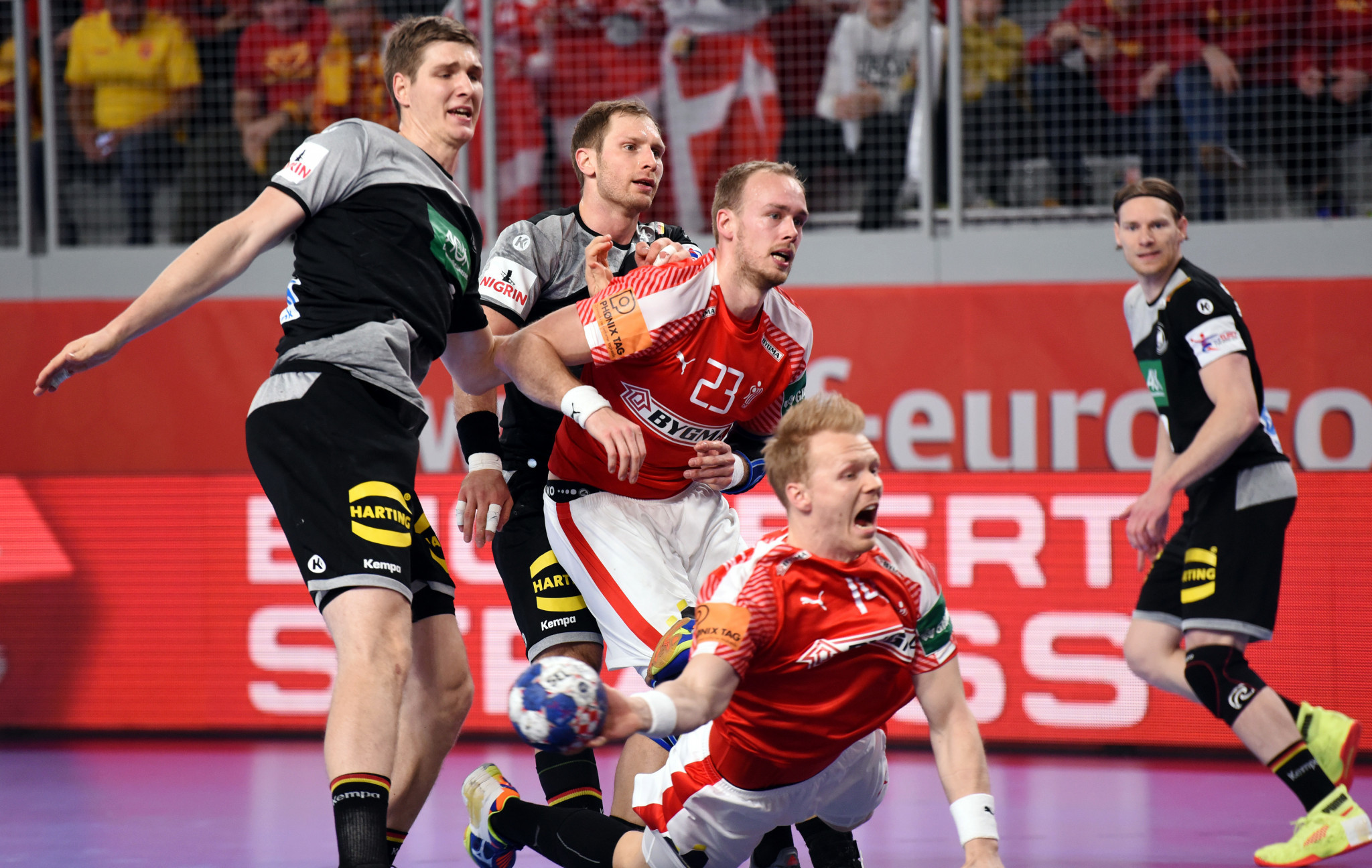 Denmark, in red, now top the group after their victory against Germany ©Getty Images