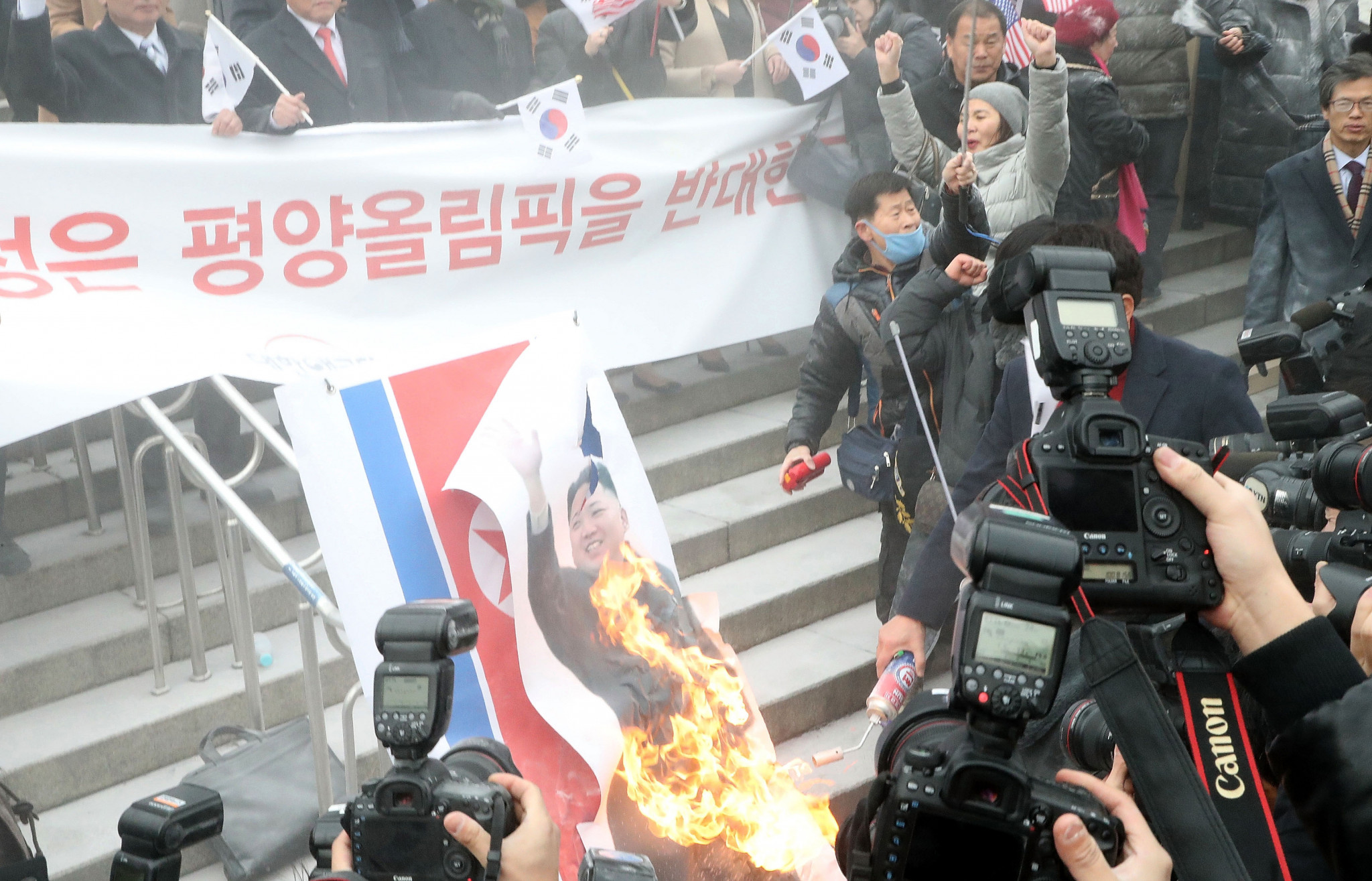 North Koreans face protest during Pyeongchang 2018 visit