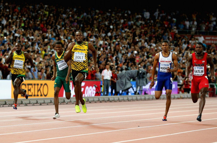 Usain Bolt heads for gold in the world 200m final as Justin Gatlin has to settle for silver again ©Getty Images