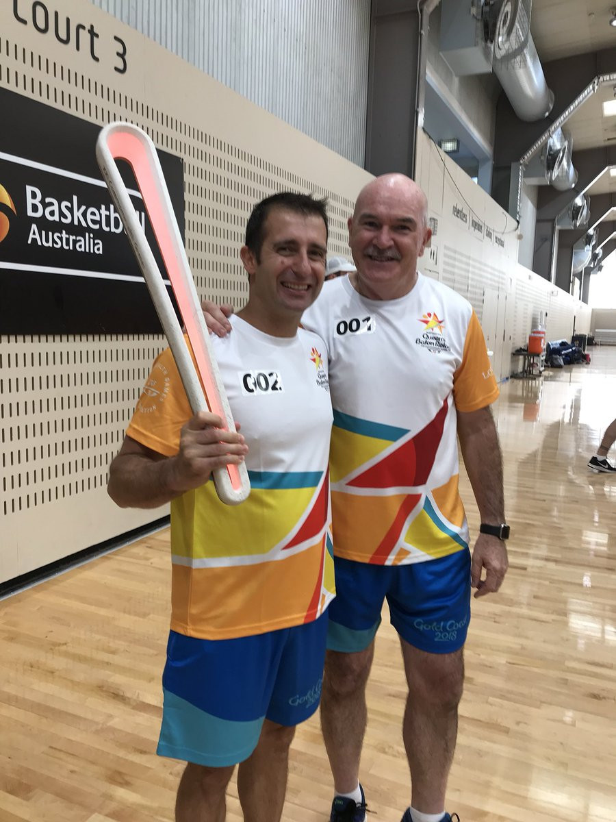 Rob de Castella, left, was the first person to carry the Queen's Baton in Canberra ©Gold Coast 2018